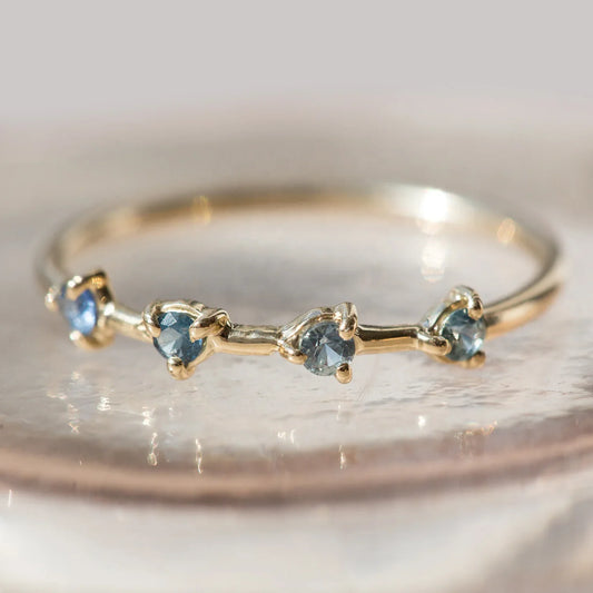 PEISHANG four-step zircon ring in 925 silver with gold-plated and rhodium-plated finish, styled as a stacking cocktail ring